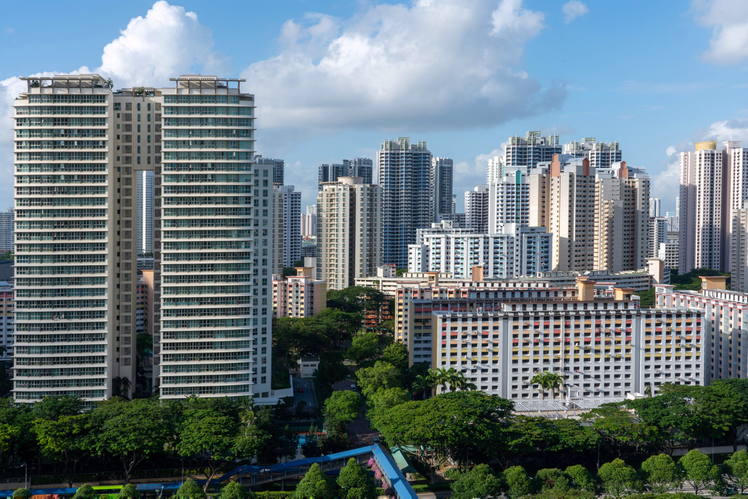 aerial shot city buildings toa payoh singapore blue sky scaled